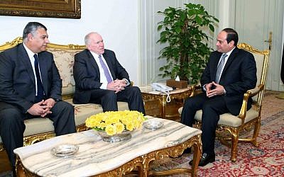 In this image provided by the office of the Egyptian Presidency, Egyptian President Abdel-Fattah el-Sissi, right, meets with CIA director John Brennan, center, and the director of Egypt’s General Intelligence Directorate Khaled Fawzy in Cairo, Sunday, April 19, 2015. (Egyptian Presidency via AP)