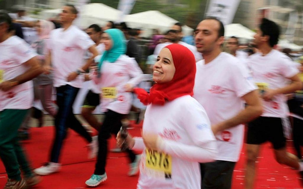 File: Egyptian runners participate in Cairo's annual Half Marathon in the Heliopolis district in Cairo, Egypt, Friday, April 17, 2015. (AP Photo/Amr Nabil)
