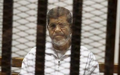 Egypt's ousted Islamist president Mohammed Morsi in a defendant cage in the Police Academy courthouse, May 8, 2014, in Cairo, Egypt. (Tarek el-Gabbas/AP/File)