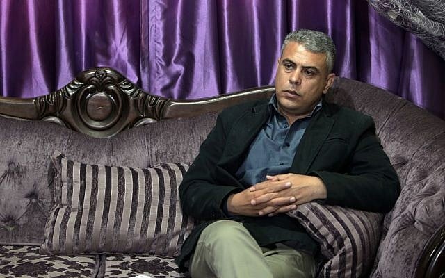 In this Sunday April, 5, 2015 photo, Palestinian Fatah activist Maamoun Sweidan speaks to the Associated Press during an interview in his house in Gaza City (photo credit: AP/Khalil Hamra)