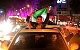 Iranians celebrate in Tehran after Iran's nuclear agreement with world powers in Lausanne, Switzerland, April 2, 2015. (photo credit: AP/Ebrahim Noroozi)