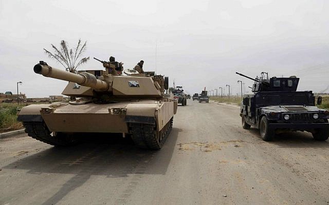 Iraqi security forces deploy in Tikrit, 80 miles (130 kilometers) north of Baghdad, Iraq, Wednesday, April 1, 2015. (AP Photo/Khalid Mohammed) Iraqi security forces deploy in Tikrit, 80 miles (130 kilometers) north of Baghdad, Iraq, Wednesday, April 1, 2015. (AP Photo/Khalid Mohammed)