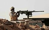 Illustrative: A Saudi soldier sits atop an armored vehicle on the border with Yemen, at a military post in Najran, Saudi Arabia, Tuesday, April 21, 2015. (AP Photo/Hasan Jamali)