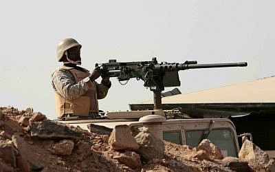 Illustrative: A Saudi soldier sits atop an armored vehicle on the border with Yemen, at a military post in Najran, Saudi Arabia, Tuesday, April 21, 2015. (AP Photo/Hasan Jamali)
