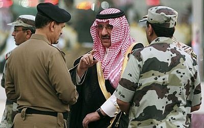 In this Oct. 20, 2012 file photo, then Saudi Deputy Interior Minister Prince Mohammed bin Nayef, center, speaks with Saudi officials while he attends a martial parade of Saudi armed forces as they prepare for the influx of people participating in the annual Hajj, in Arafat, outside of Mecca, Saudi Arabia. (photo credit: AP Photo)