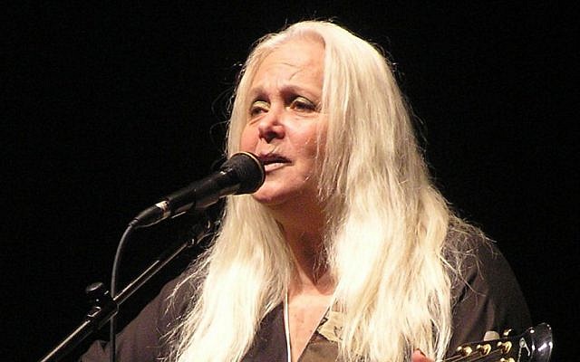 Miri Aloni, still playing the guitar (photo credit: Emmanuel Yalin/CC BY SA 3.0)