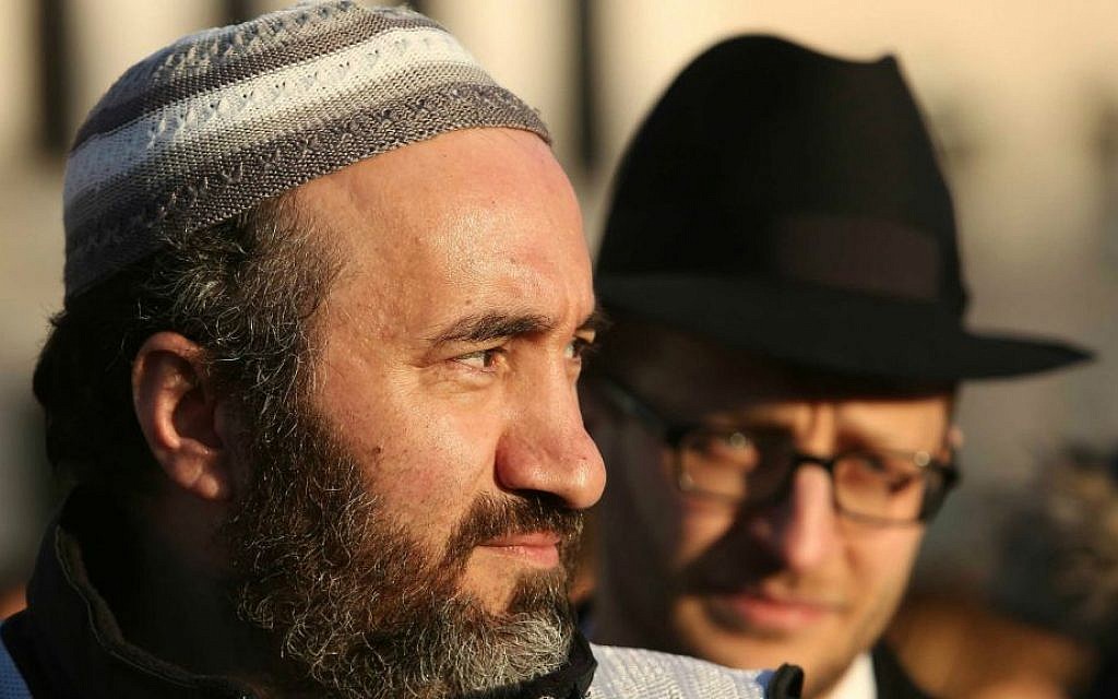 Illustrative: An American Muslim man standing next to an American Jewish man. (Adam Berry/Getty Images/via JTA) Illustrative: An American Muslim man standing next to an American Jewish man. (Adam Berry/Getty Images/via JTA)