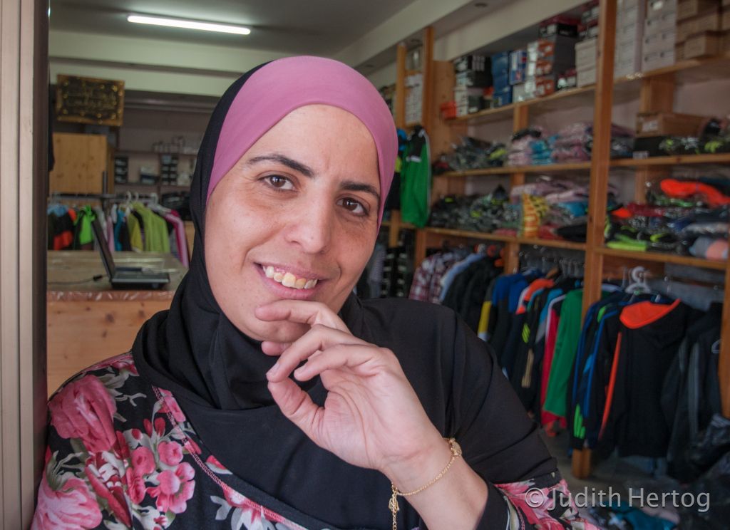 Nada Mansoor, 33, on Jaffa Road in Tira, where she lives: "Believe me! I’ve done things a man can’t do!" (Photo credit: Judith Hertog) 