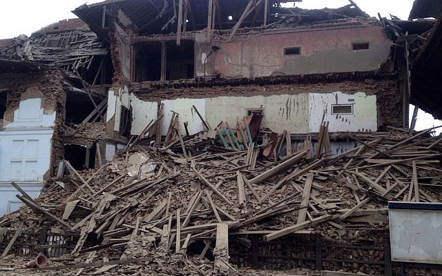 A building stands damaged after an earthquake in Kathmandu, Nepal, Saturday, April 25, 2015. (Photo credit: AP/ Niranjan Shrestha) A building stands damaged after an earthquake in Kathmandu, Nepal, Saturday, April 25, 2015. (Photo credit: AP/ Niranjan Shrestha)