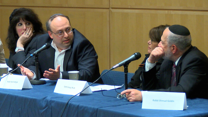 From left, Naomi Mark, community psychotherapist; Rabbi Nathaniel Helfgot, chair of the Department of Talmud at SAR High School; Lynn Levy, Yeshiva University professor; and Rabbi Shmuel Goldin, former president of the RCA, at a landmark conference at Columbia University on homosexuality and Orthodoxy, April 19, 2015. (Courtesy of JQY/via JTA) From left, Naomi Mark, community psychotherapist; Rabbi Nathaniel Helfgot, chair of the Department of Talmud at SAR High School; Lynn Levy, Yeshiva University professor; and Rabbi Shmuel Goldin, former president of the RCA, at a landmark conference at Columbia University on homosexuality and Orthodoxy, April 19, 2015. (Courtesy of JQY/via JTA)