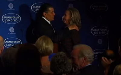 Haim Saban welcomes Hillary Clinton to a Saban Forum event in 2012 (YouTube screenshot)
