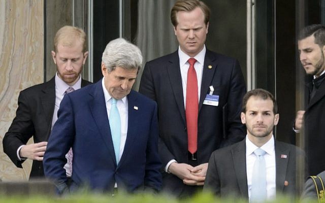 US Secretary of State John Kerry, front left, walks during a break outside the Beau Rivage Palace Hotel as the Iran nuclear talks continue, in Lausanne, Switzerland, Wednesday, April 1, 2015. (photo credit: AP Photo/Keystone,Laurent Gillieron)