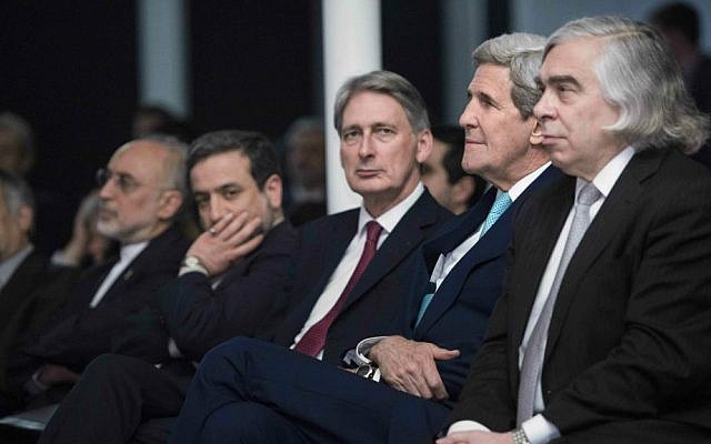 British Foreign Secretary Philip Hammond, center, US Secretary of State John Kerry, center right and US Secretary of Energy Ernest Moniz listen while Iranian Foreign Minister Javad Zarif makes a statement in Lausanne, Switzerland, Thursday, April 2, 2015, after Iran nuclear program talks finished with extended sessions. (AP Photo/Brendan Smialowski, Pool) British Foreign Secretary Philip Hammond, center, US Secretary of State John Kerry, center right and US Secretary of Energy Ernest Moniz listen while Iranian Foreign Minister Javad Zarif makes a statement in Lausanne, Switzerland, Thursday, April 2, 2015, after Iran nuclear program talks finished with extended sessions. (AP Photo/Brendan Smialowski, Pool)