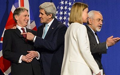 From left, British Foreign Secretary Philip Hammond, US Secretary of State John Kerry, EU foreign affairs chief Federica Mogherini, and Iranian Foreign Minister Mohammad Javad Zarif in Lausanne, Switzerland, Thursday, April 2, 2015. (Photo credit: AP/Keystone, Jean-Christophe Bott)