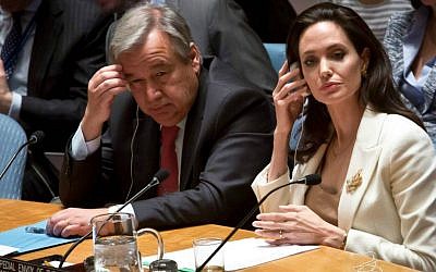 UN Special Envoy for Refugees and actress Angelina Jolie, right, and then-UN High Commissioner for Refugees António Guterres, left, brief the UN Security Council on Syria's refugee crisis, Friday, April 24, 2015. (AP Photo/Bebeto Matthews)