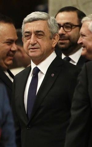 Armenian President Serzh Sargsyan (C), arrives to attend an Armenian-Rite Mass celebrated by Pope Francis on the occasion of the commemoration of the 100th anniversary of the Armenian Genocide, in St. Peter's Basilica, at the Vatican, Sunday, April 12, 2015. (photo credit: AP/Gregorio Borgia) Armenian President Serzh Sargsyan (C), arrives to attend an Armenian-Rite Mass celebrated by Pope Francis on the occasion of the commemoration of the 100th anniversary of the Armenian Genocide, in St. Peter's Basilica, at the Vatican, Sunday, April 12, 2015. (photo credit: AP/Gregorio Borgia)