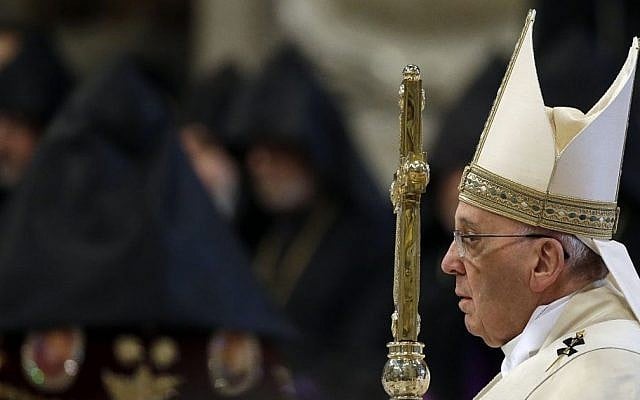 Pope Francis arrives to celebrates an Armenian-Rite Mass on the occasion of the commemoration of the 100th anniversary of the Armenian Genocide, in St. Peter's Basilica, at the Vatican Sunday, April 12, 2015. (photo credit: AP/Gregorio Borgia) Pope Francis arrives to celebrates an Armenian-Rite Mass on the occasion of the commemoration of the 100th anniversary of the Armenian Genocide, in St. Peter's Basilica, at the Vatican Sunday, April 12, 2015. (photo credit: AP/Gregorio Borgia)