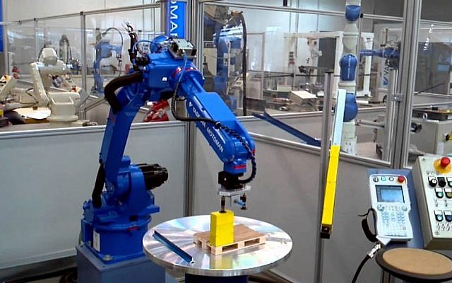 A Yaskawa robot in action (Photo credit: Courtesy) A Yaskawa robot in action (Photo credit: Courtesy)
