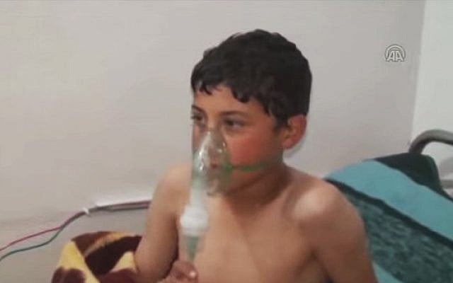 A child victim of a suspected chlorine attack in Idlib, Syria, in March 2015 (screen capture: YouTube) A child victim of a suspected chlorine attack in Idlib, Syria, in March 2015 (screen capture: YouTube)