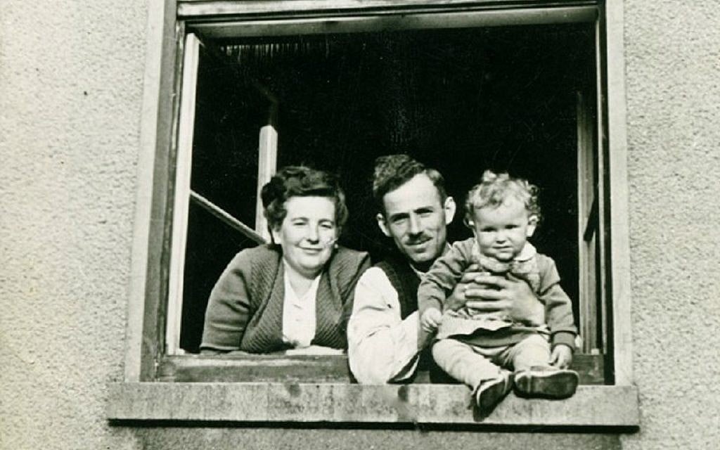 Dina Lichtman with her parents Bella Cypris and Roman Lichtman in a 1949 photo taken at the Bergen-Belsen DP camp that they used for a Jewish New Year's greeting card. (photo credit: courtesy of Dina Lichtman) Dina Lichtman with her parents Bella Cypris and Roman Lichtman in a 1949 photo taken at the Bergen-Belsen DP camp that they used for a Jewish New Year's greeting card. (photo credit: courtesy of Dina Lichtman)