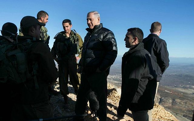 Prime Minister Benjamin Netanyahu during a February 4, 2015, visit to an army position on Mount Hermon (photo credit: AP Photo/ Baz Ratner, pool) Prime Minister Benjamin Netanyahu during a February 4, 2015, visit to an army position on Mount Hermon (photo credit: AP Photo/ Baz Ratner, pool)