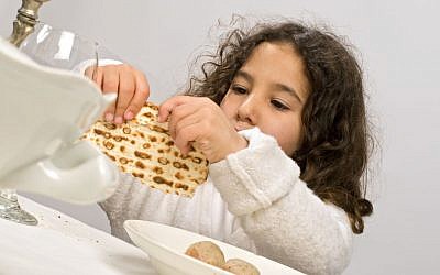 Illustrative: The seder involves multiple senses such as touch, smell and taste. (Shutterstock, via JTA)
