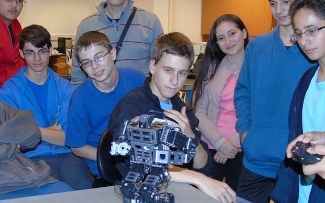 The Haifa team shows off its Dalek firefighting robot (Photo credit: Haifa municipality)