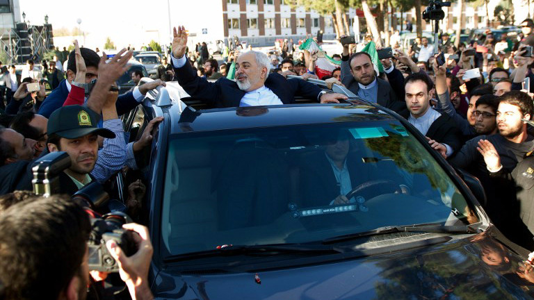 Iranian Foreign Minister Mohammad Javad Zarif (C) greets people as the nuclear negotiating committee arrives at Mehr Abad Airport in Tehran on April 3, 2015, hours after announcing they had the ingredients of a historic nuclear deal with world powers. (photo credit: AFP/ISNA/Borna Ghasemi) Iranian Foreign Minister Mohammad Javad Zarif (C) greets people as the nuclear negotiating committee arrives at Mehr Abad Airport in Tehran on April 3, 2015, hours after announcing they had the ingredients of a historic nuclear deal with world powers. (photo credit: AFP/ISNA/Borna Ghasemi)
