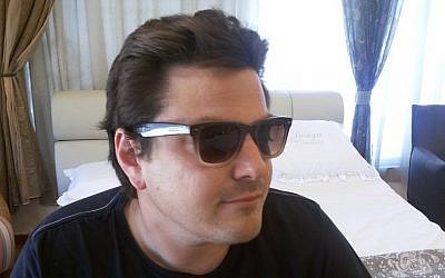 Jason Frederic Gilbert writes Hebrew subtitles for movies, some of them porn. (photo credit: Hillel Kuttler/JTA)