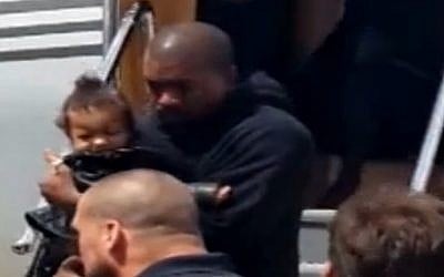 Kanye West, baby North West land in Israel on April 13, 2015 (screen capture: Channel 2)