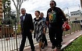 Former President Moshe Katsav, who is serving a seven-year sentence for rape, seen leaving Ma'asiyahu Prison with his wife Gila for a Passover furlough on April 3, 2015. (Flash90)