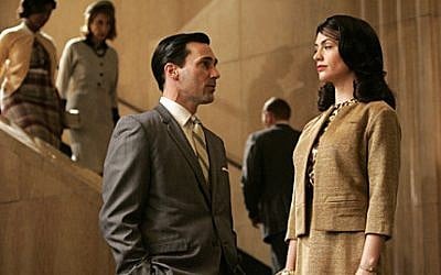 Jon Hamm as Don Draper and Maggie Siff as Rachel Menken in AMC's Mad Men. (photo credit: Doug Hyun/AMC)