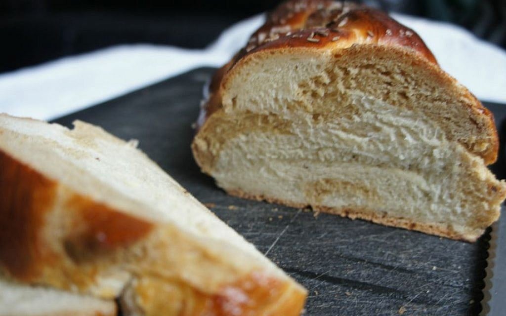 This hybrid challah is the ideal vessel for some pastrami and mustard. (Shannon Sarna/The Nosher/JTA) This hybrid challah is the ideal vessel for some pastrami and mustard. (Shannon Sarna/The Nosher/JTA)