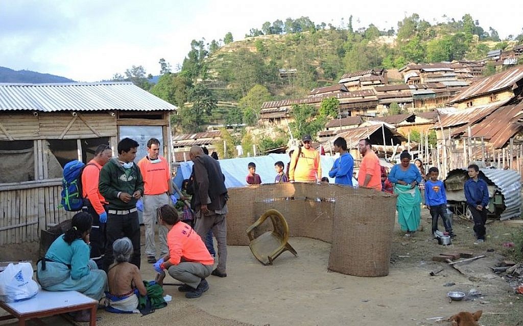 Isralife paramedics set up a makeshift clinic in a remote village outside of Kathmandu on Thursday April 30, 2015. (Photo credit: Melanie Lidman/Times of Israel)