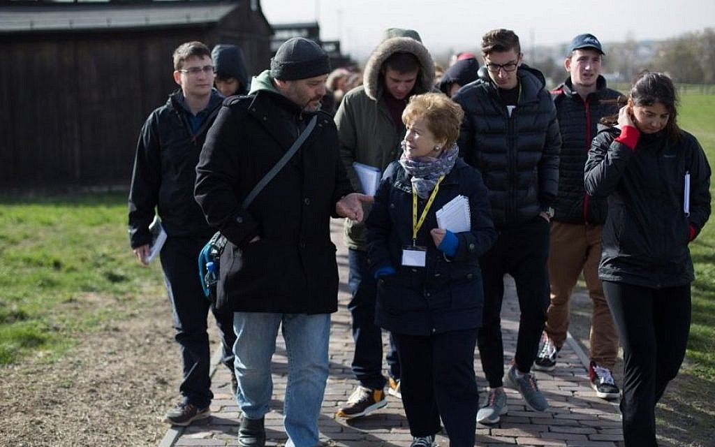 Belsen survivor Mala Tribich, 85, right, with UK delegates in Birkenau. (Photo credit: Sam Churchill Photography)