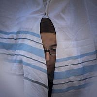A boy peeks out from behind a prayer shawl during the annual priestly blessing at the Western Wall April 6, 2015. (Photo credit: Yonatan Sindel/Flash90) A boy peeks out from behind a prayer shawl during the annual priestly blessing at the Western Wall April 6, 2015. (Photo credit: Yonatan Sindel/Flash90)