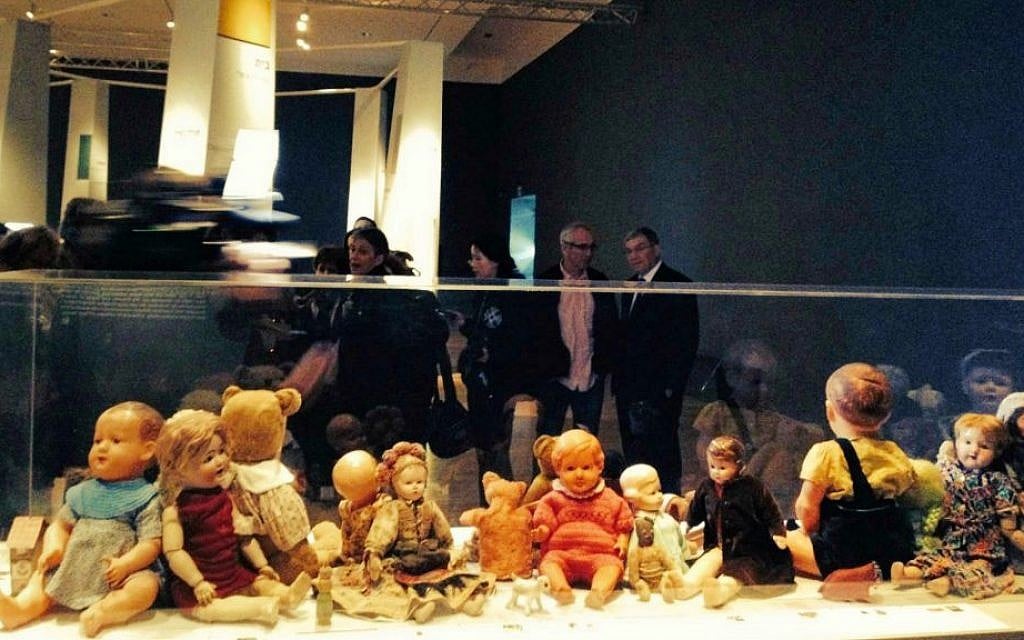 A vitrine of dolls, teddy bears and toys that belonged to survivors and children who didn't survive the Holocaust, at Yad Vashem's new exhibit, 'Stars Without A Heaven' (photo credit: Jessica Steinberg/Times of Israel) A vitrine of dolls, teddy bears and toys that belonged to survivors and children who didn't survive the Holocaust, at Yad Vashem's new exhibit, 'Stars Without A Heaven' (photo credit: Jessica Steinberg/Times of Israel)