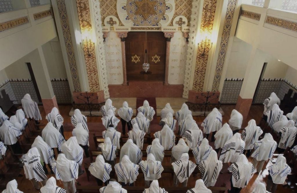 Congregants praying at the Kadoorie Synagogue in Porto, Portugal, May 2014. (Courtesy of the Jewish community of Porto/JTA) Congregants praying at the Kadoorie Synagogue in Porto, Portugal, May 2014. (Courtesy of the Jewish community of Porto/JTA)