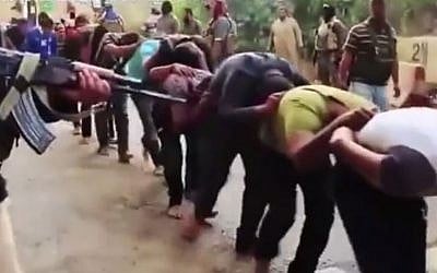 Screen capture from video allegedly showing Islamic State militants marching captive Iraqis to their mass execution in Tikrit, April 2014. (screen capture: YouTube/Bengal Newz) Screen capture from video allegedly showing Islamic State militants marching captive Iraqis to their mass execution in Tikrit, April 2014. (screen capture: YouTube/Bengal Newz)