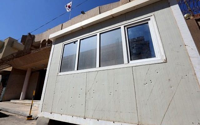 A picture taken on April 12, 2015 shows bullet holes in the guard post in front of the South Korean Embassy in the Libyan capital Tripoli following a gunmen attack on the embassy compound. (AFP/ MAHMUD TURKIA) A picture taken on April 12, 2015 shows bullet holes in the guard post in front of the South Korean Embassy in the Libyan capital Tripoli following a gunmen attack on the embassy compound. (AFP/ MAHMUD TURKIA)