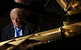 Argentinian-Israeli pianist and conductor Daniel Barenboim plays on his new piano at the Royal Festival Hall in London on May 26, 2015 (AFP/ADRIAN DENNIS)