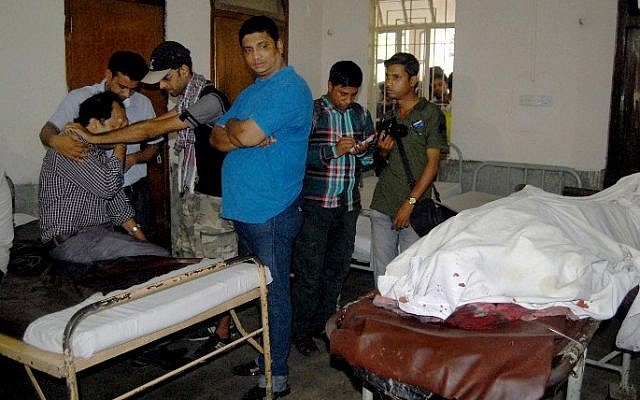 Relatives of deceased Bangladeshi blogger Ananta Bijoy Das react after seeing his body in Sylhet on May 12, 2015. (photo credit: AFP) Relatives of deceased Bangladeshi blogger Ananta Bijoy Das react after seeing his body in Sylhet on May 12, 2015. (photo credit: AFP)
