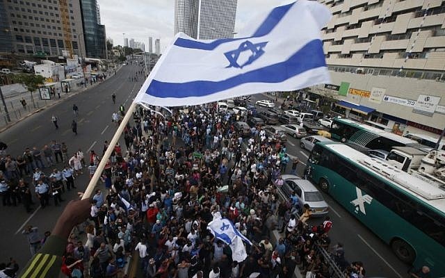 Israelis take part in a demonstration in Tel Aviv on May 3, 2015 against alleged police brutality and institutionalized discrimination against the Ethiopian Jewish community. (AFP/Jack Guez)