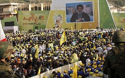 Lebanese supporters of Hezbollah gather in the southern town of Nabatiyeh on May 24, 2015, to watch a televised address by Hassan Nasrallah, the movement's chief, to mark the 15th anniversary of the Israeli withdrawal from south Lebanon. (Mahmoud Zayyat/AFP) Lebanese supporters of Hezbollah gather in the southern town of Nabatiyeh on May 24, 2015 (Mahmoud Zayyat/AFP)