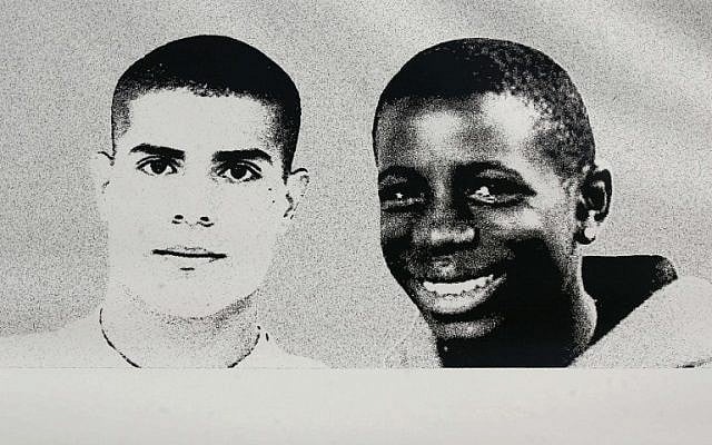 A poster in Clichy- sous-Bois in 2006 shows Zyed Benna, left, and Bouna Traore (OLIVIER LABAN-MATTEI/AFP) A poster in Clichy- sous-Bois in 2006 shows Zyed Benna, left, and Bouna Traore (OLIVIER LABAN-MATTEI/AFP)