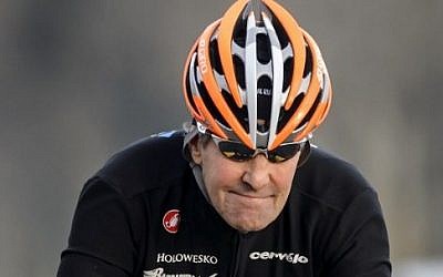 US Secretary of State John Kerry rides his bike during a break in Lausanne, March 16, 2015. (AFP / FABRICE COFFRINI)