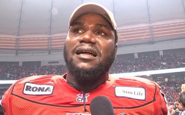 Canadian football star Khalif Mitchell, after winning the 99th Grey Cup Championship with the B.C. Lions in 2011. (screen capture: YouTube) Canadian football star Khalif Mitchell, after winning the 99th Grey Cup Championship with the B.C. Lions in 2011. (screen capture: YouTube)