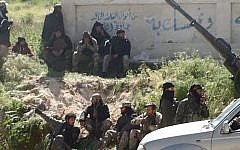 Illustrative: This image posted on the Twitter page of Syria's al-Qaeda-linked Nusra Front on Saturday, April 25, 2015, shows Nusra Front fighters in the town of Jisr al-Shughour, Idlib province, Syria. (AP)