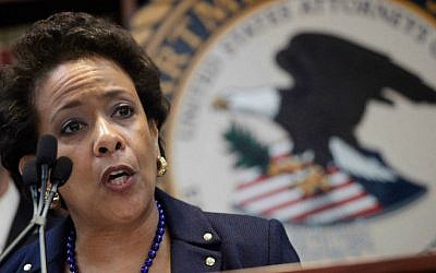 US Attorney General Loretta Lynch announces an indictment against nine FIFA officials and five corporate executives for racketeering, conspiracy and corruption at a news conference, Wednesday, May 27, 2015, in the Brooklyn borough of New York. (AP Photo/Mark Lennihan)