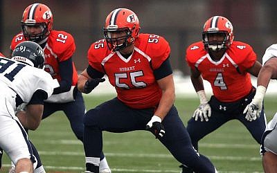 Ali Marpet, number 55, in action for Hobart College, expects to go in the first four rounds of the NFL Draft. (Kevin Colton/Hobart College/JTA)